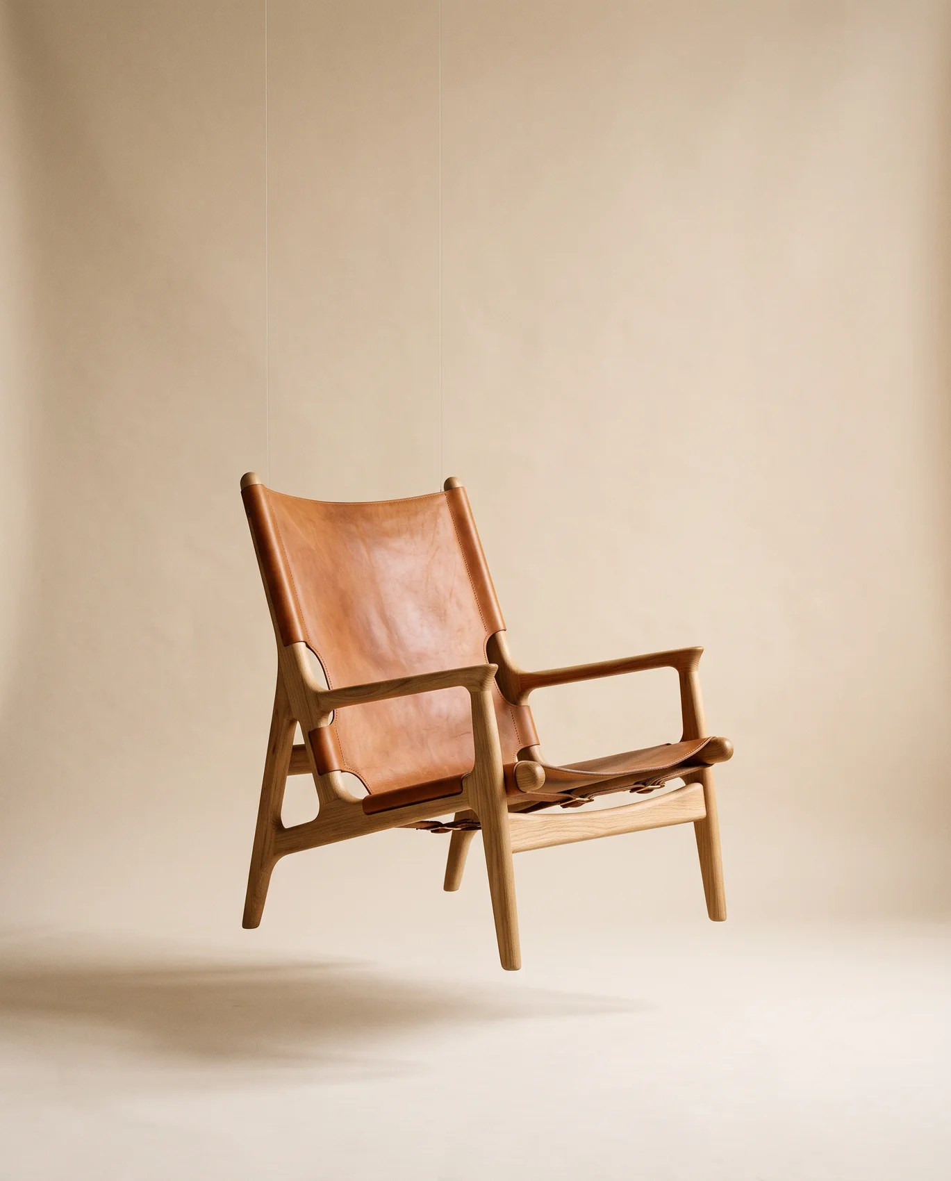 The Rutledge Lounge Chair — white oak and saddle leather
