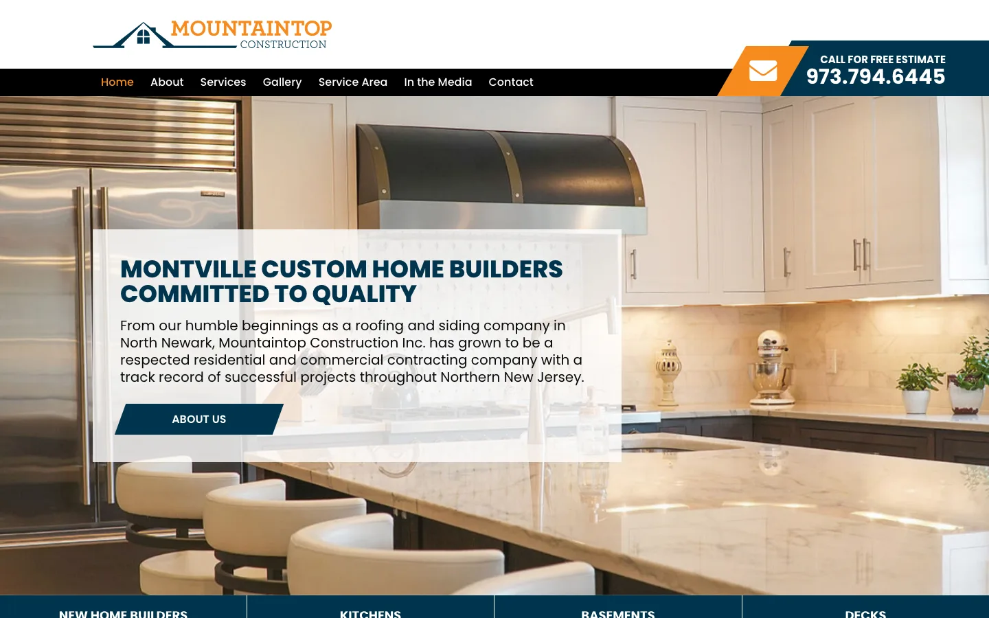 The previous Mountaintop Construction website: a pale header with a small logo and text navigation above a kitchen photograph, with the headline set in a translucent panel over it